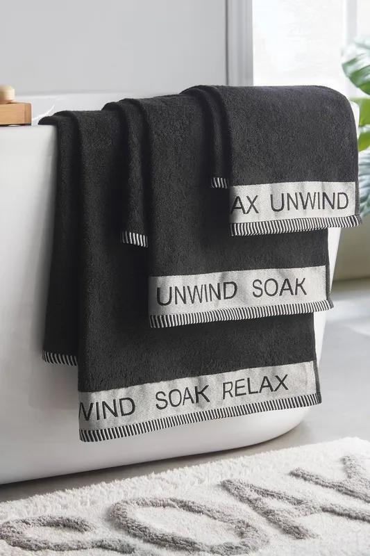 Catherine Lansfield 'Relax & Unwind' 4 Piece Towel Set in Black - Black