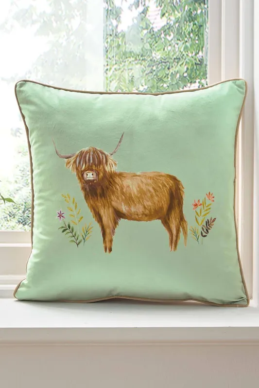 Cotton Traders Highland Cow Velvet Cushion in Green - Green - Size: One Size