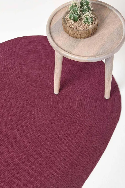 Homescapes Handmade Woven Braided Oval Rug in Plum Size: 110cm x 170cm - Plum