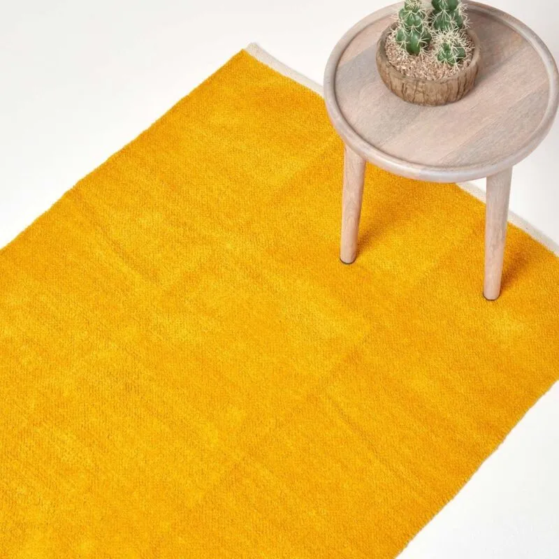 Homescapes - Mustard 100% Cotton Plain Chenille Rug with Natural Trim, 110 x 170 cm
