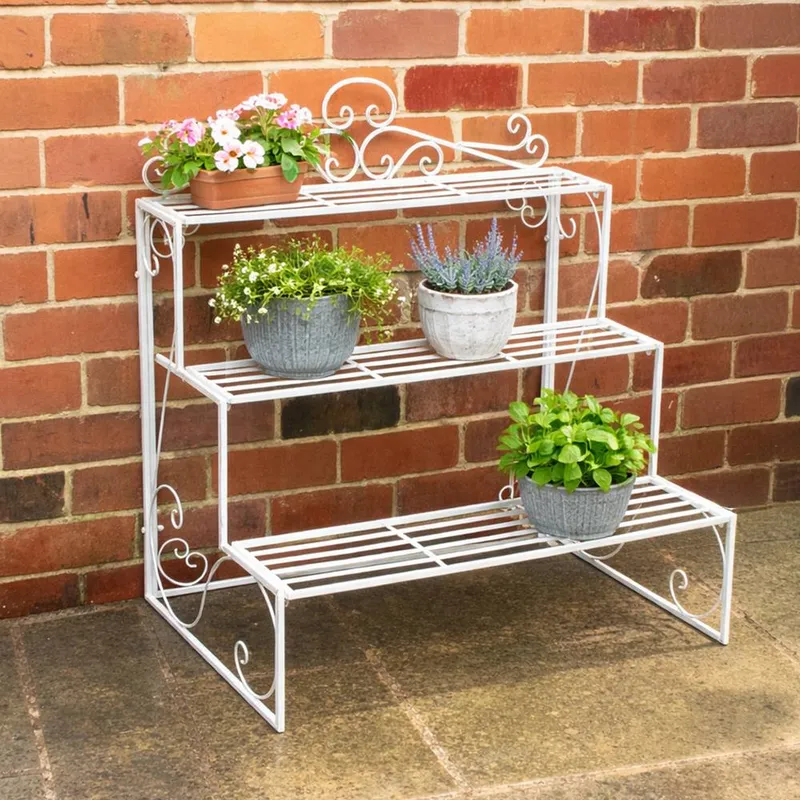 Melody Maison Distressed White Metal Three Tier Plant Theatre Stand White