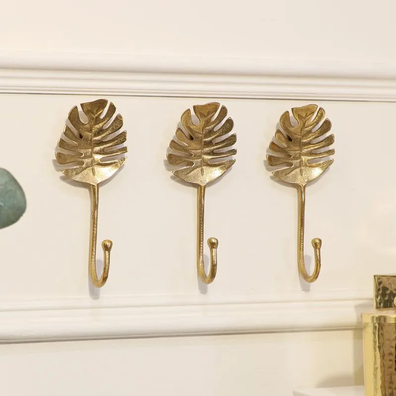 Melody Maison Set Of 3 Gold Monstera Leaf Wall Hooks in Metallic Gold Metallic Gold