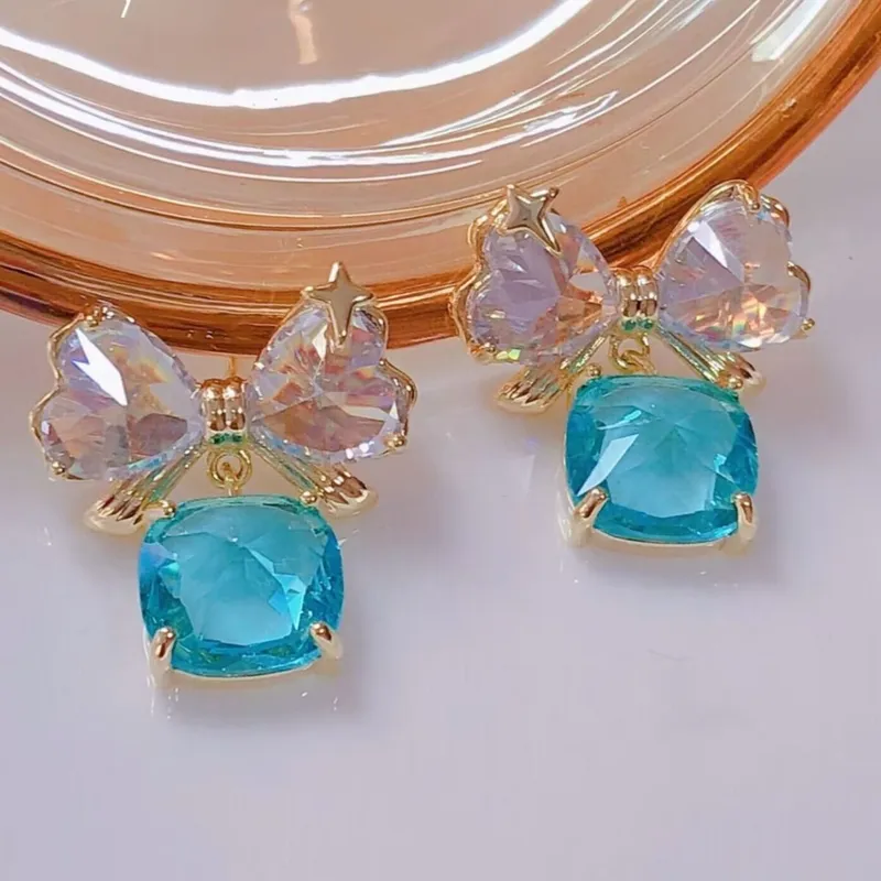 Peach Accessories Women's Blue Sparkling Crystal Bow Drop Earrings - Blue