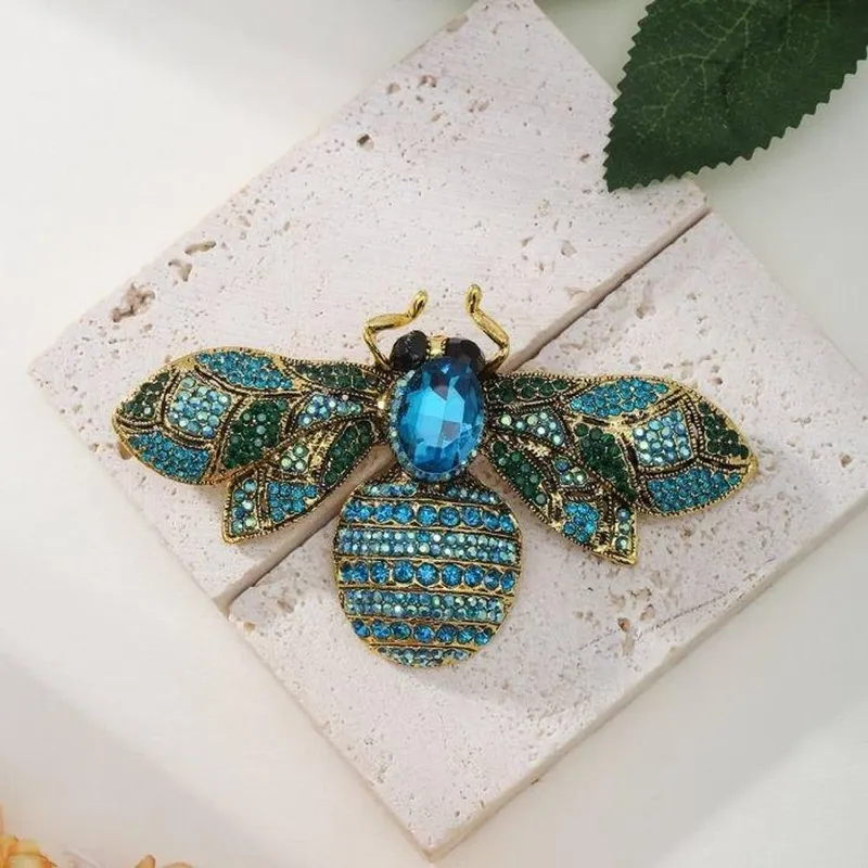 Peach Accessories Women's Crystal Bee Brooch in Blue Blue female
