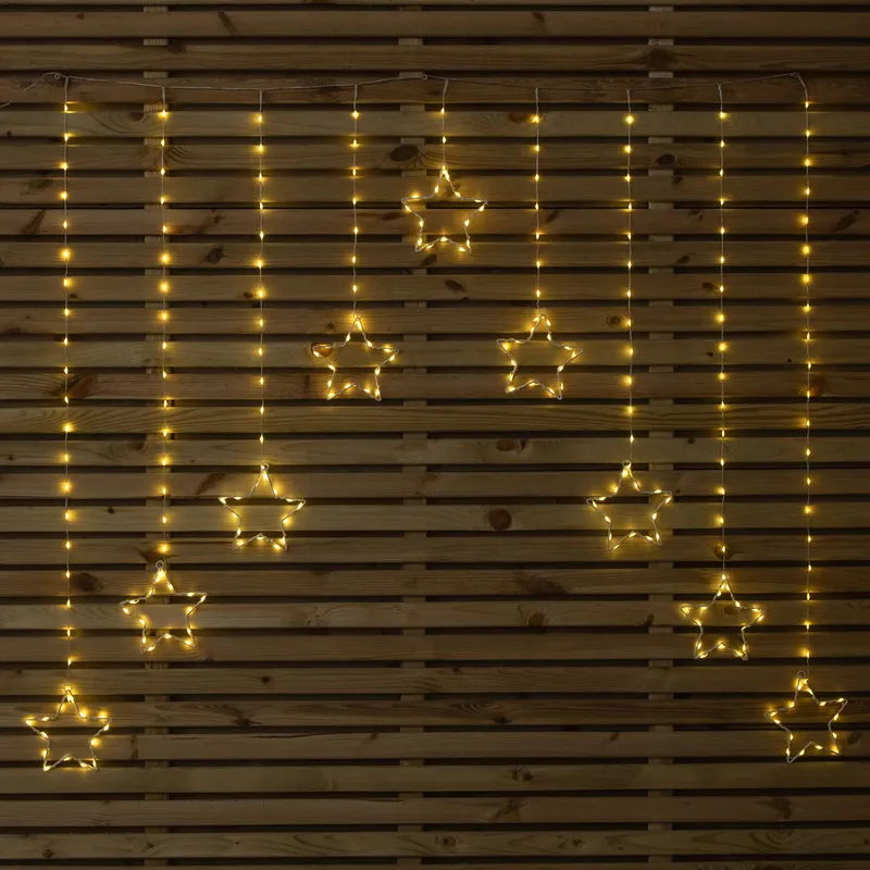 Samuel Alexander 1.2m Light up Star Curtain Christmas Lights with Warm White LEDs White